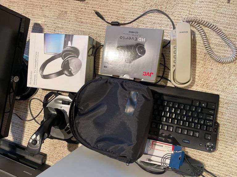 Nice lot of computers and electronic accessories, including hand, controller, monitor, and printer.