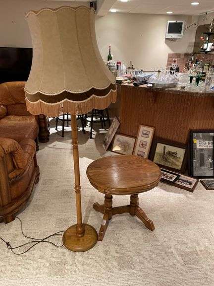 Basement. Wooden base standing lamp and matching small side table approximately 24 inches tall.