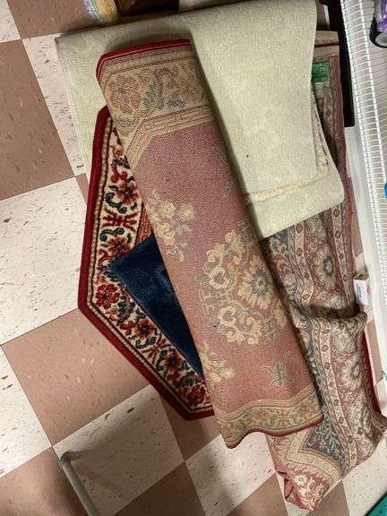 Lot of miscellaneous rugs.