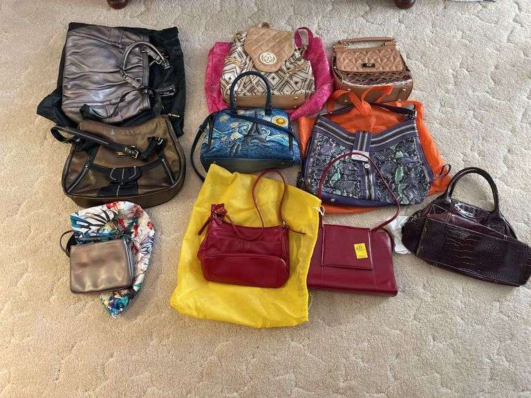 Nice lot of ladies, purses, including designer backpack.