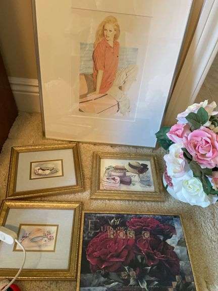 Bedroom. Framed art pieces and art glass lamp.