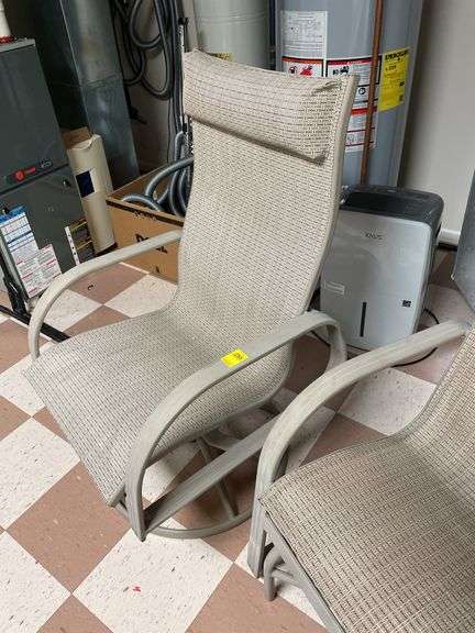 Nice outdoor set includes two rockers and glider and small resin table. Basement.