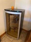 Haier Wine Cooler plugged in and working.