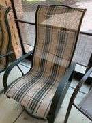 Outdoor set includes four chairs and round table also includes three miscellaneous outdoor side chairs