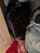 Bedroom. Contents of bedroom closet. Men’s clothing, extra large shirts, polos and button ups suit jackets, mostly size 48. Some linens, shoes, pillows, miscellaneous.