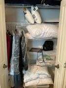 Contents of closet in children’s bedroom. Includes framed prints. Pillows. Some clothing. Fans, craft items, Miscellaneous.