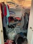 Bedroom. Contents of bedroom closet. Men’s clothing, extra large shirts, polos and button ups suit jackets, mostly size 48. Some linens, shoes, pillows, miscellaneous.