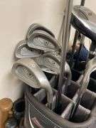 Ping Eye two golf clubs, miscellaneous baseball bats.
