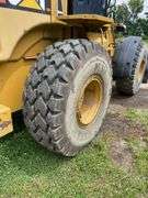 CAT 930 G wheel loader. Diesel engine. Cab/EROPS. serial number CAT8938GLTWR88846. 4232 hours showing on Dash. Started and ran. Quick coupler bucket includes set of forks. AC Not working. See Photos for Video of Equipment in Operation. FOR THOSE AT FIRST PICKUP: this loader was used by Big Jim to load out the auction This will be used for the load out on the Pick Up cannot be removed until final hour of Pick Up*- $1000 deposit. balance in ACH or certified check within 48 hours of auction close- NO Sales Tax Collected