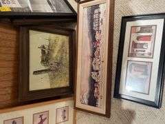 Basement. Large lot of framed wall art includes some prints photographs unique scenes. Nice variety review pictures for all pieces.