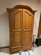 Basement. Maple wardrobe. Approximately 78 inches tall 40 inches wide 16 inches deep.