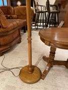 Basement. Wooden base standing lamp and matching small side table approximately 24 inches tall.