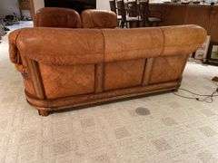 Basement. Assuming Ligne Mur. Well-made leather furniture, set sofa two side, chairs and ottomans. (One ottoman found later not pictured) Some Loss review the photos. But high quality furniture set.