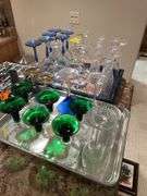 Basement. Two trays of stemware including crystal wine glasses