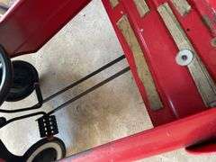 Vintage pedal car with all four wheels, pedals, and steering wheel intact