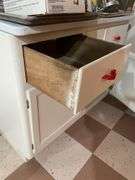 Basement. Vintage kitchen Hosier cabinet.  Painted White with red handles. Approximately 71 inches tall by 39 inches wide. Nice piece.