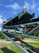 Approximately 80 foot Cumins diesel engine driven wheeled portable aggregate conveyor. Shows 1239 hours on meter. Started at inspection. -$1000 deposit. balance in ACH or certified check within 48 hours of auction close
