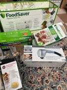 Nice lot includes Cuisinart meat grinder, food, saver, slicer, home medics massage unit. All for one money.