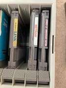 Living room. Lot of Nintendo games. Featuring Mario. Simpsons. Other unique and classic titles. Includes VHS of Nirvana live tonight sold out.