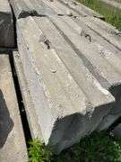 Approximately 84 stackable concrete Bin Blocks. Approximately 6’x2’x2’