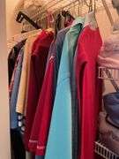Bedroom. Contents of bedroom closet. Men’s clothing, extra large shirts, polos and button ups suit jackets, mostly size 48. Some linens, shoes, pillows, miscellaneous.