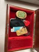 Ornate inlaid  box includes miscellaneous.