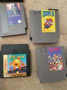 Living room. Lot of Nintendo games. Featuring Mario. Simpsons. Other unique and classic titles. Includes VHS of Nirvana live tonight sold out.