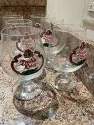 Basement. Beer, glasses, and vintage pillsner glasses.