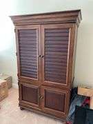Living room. Entertainment cabinet. 78 inches tall 43 inches wide 25 inches deep.