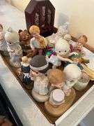 Entryway. Figurine lot featuring precious moments.
