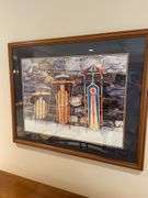 Sled print framed and matted under glass approximately 34 inches wide