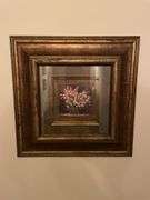 First floor half bath. Four framed art pieces.