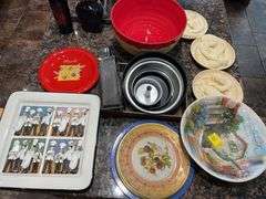 Kitchen. Kitchen accessories on top of island. Does not include food drinks or the plant.