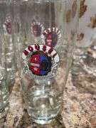 Basement. Beer, glasses, and vintage pillsner glasses.