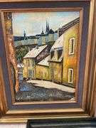 Living room. Four framed pieces of art including tile