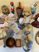 Then. Enormous lot of decor pieces. Treasures abound. Entire table top.
