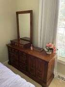 Pennsylvania house queen bedroom set. Includes queen size bed frame mattress. Standing dresser. Dresser with mirror. Nightstand.  and miscellaneous.  Linens. Clean pet free home