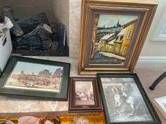 Living room. Four framed pieces of art including tile