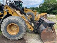 CAT 930 G wheel loader. Diesel engine. Cab/EROPS. serial number CAT8938GLTWR88846. 4232 hours showing on Dash. Started and ran. Quick coupler bucket includes set of forks. AC Not working. See Photos for Video of Equipment in Operation. FOR THOSE AT FIRST PICKUP: this loader was used by Big Jim to load out the auction This will be used for the load out on the Pick Up cannot be removed until final hour of Pick Up*- $1000 deposit. balance in ACH or certified check within 48 hours of auction close- NO Sales Tax Collected