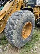 CAT 930 G wheel loader. Diesel engine. Cab/EROPS. serial number CAT8938GLTWR88846. 4232 hours showing on Dash. Started and ran. Quick coupler bucket includes set of forks. AC Not working. See Photos for Video of Equipment in Operation. FOR THOSE AT FIRST PICKUP: this loader was used by Big Jim to load out the auction This will be used for the load out on the Pick Up cannot be removed until final hour of Pick Up*- $1000 deposit. balance in ACH or certified check within 48 hours of auction close- NO Sales Tax Collected