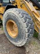 CAT 930 G wheel loader. Diesel engine. Cab/EROPS. serial number CAT8938GLTWR88846. 4232 hours showing on Dash. Started and ran. Quick coupler bucket includes set of forks. AC Not working. See Photos for Video of Equipment in Operation. FOR THOSE AT FIRST PICKUP: this loader was used by Big Jim to load out the auction This will be used for the load out on the Pick Up cannot be removed until final hour of Pick Up*- $1000 deposit. balance in ACH or certified check within 48 hours of auction close- NO Sales Tax Collected