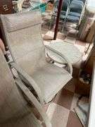 Nice outdoor set includes two rockers and glider and small resin table. Basement.