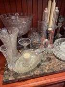 Dining room. Large lot of high quality crystal Stemware. Miscellaneous plates.