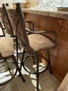 Basement. Five barstools. Cushioned and in good condition. By the piece times bid.