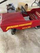 Vintage pedal car with all four wheels, pedals, and steering wheel intact