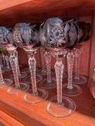 Dining room. Large lot of high quality crystal Stemware. Miscellaneous plates.