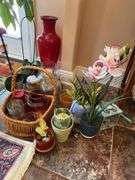 Sunroom. Two floral rugs. With decor and faux plant. Vases basket and faux plants.