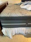 High quality king bedroom includes newer beauty rest king size mattress with bedding and Laura Ashley home ornate frame and headboard. Laura Ashley home Matching nightstands that have cabinets in them matching headboard made of hardwood. Leather top ottoman. With matching Laura Ashley home dresser with mirror..  High quality bedding included.  Clean pet free home