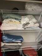 Bedroom. Contents of bedroom closet. Men’s clothing, extra large shirts, polos and button ups suit jackets, mostly size 48. Some linens, shoes, pillows, miscellaneous.