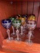 Dining room. Large lot of high quality crystal Stemware. Miscellaneous plates.